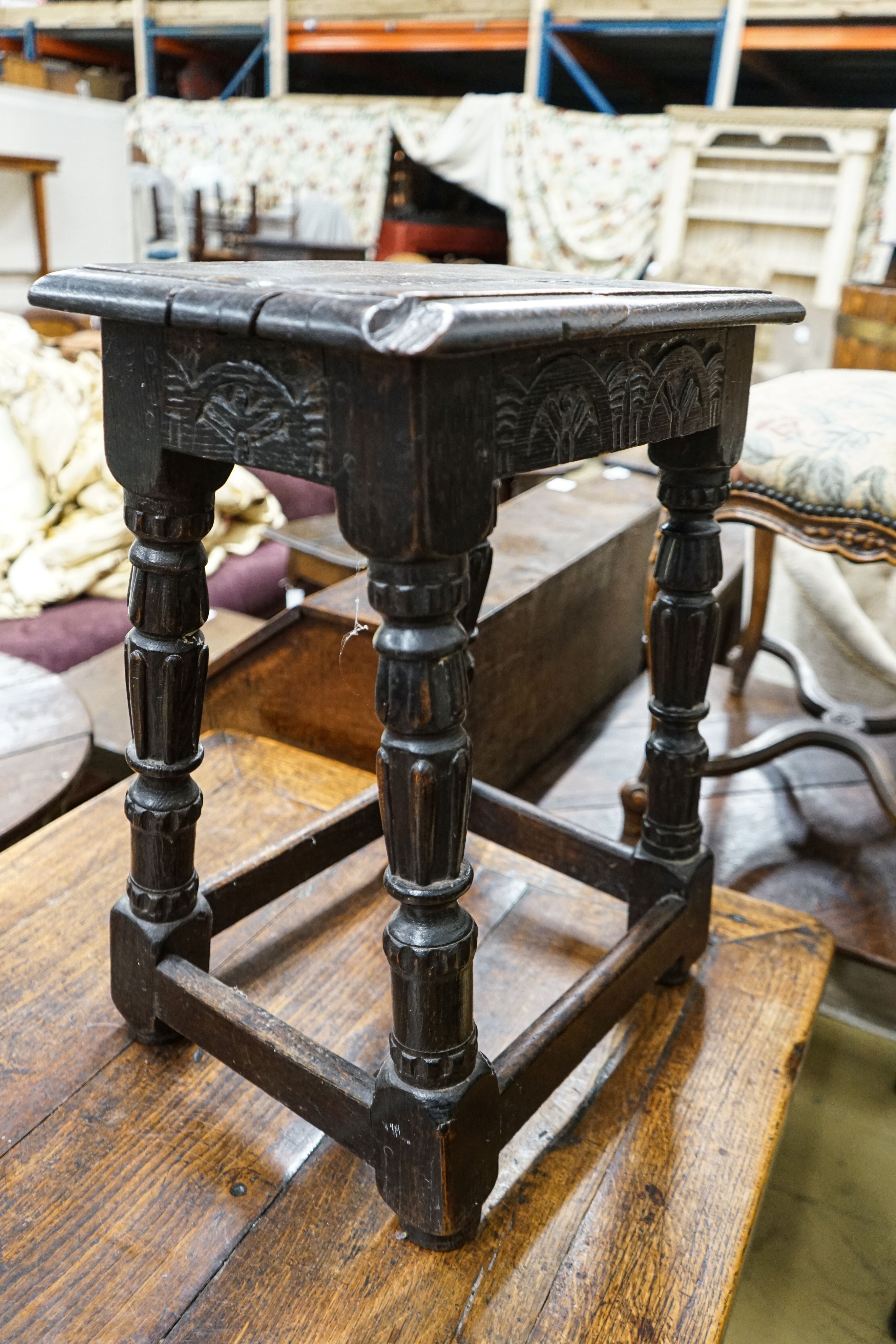 A late 18th century style stained oak joint stool, with turned and fluted legs, width 44cm, depth 28cm, height 56cm